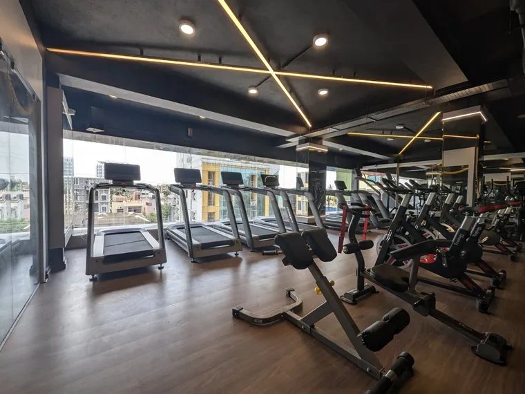 Cardio and resistance equipment inside Invictus Fitness